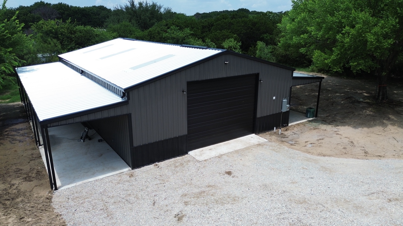 Finished steel barndominium and shop in North Texas, drone view